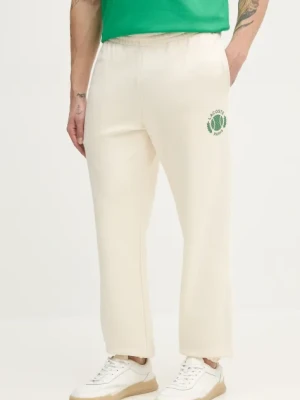 Lacoste spodnie dresowe męskie kolor beżowy z nadrukiem XH9777