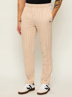 Lacoste Spodnie dresowe | Regular Fit beżowy
