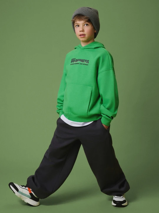 Zdjęcie produktu 4F Bluza dresowa loose z kapturem chłopięca - zielona 122 / 128 (6-8 lat)
