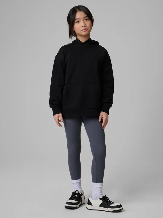Zdjęcie produktu 4F Bluza dresowa loose z kapturem dziewczęca - czarna 146/152 (10-12 lat)