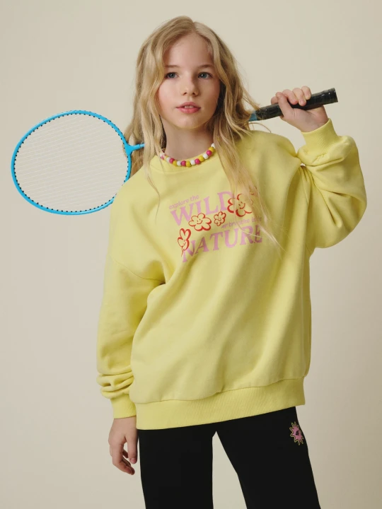 Zdjęcie produktu 4F Bluza dresowa oversize bez kaptura dziewczęca - żółta 122/128 (6-8 lat)