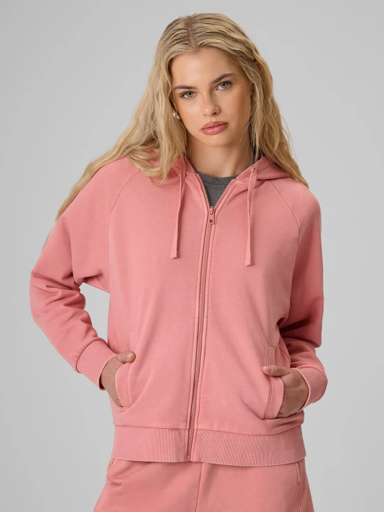 Zdjęcie produktu 4F Bluza dresowa relaxed z kapturem damska - łososiowa XS Pomarańczowy
