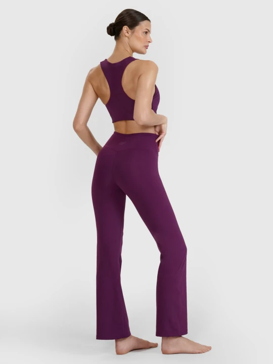 Zdjęcie produktu 4F Legginsy do jogi i pilatesu z rozszerzanymi nogawkami damskie - fioletowe XS