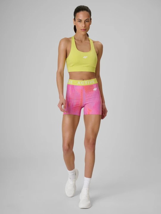 Zdjęcie produktu 4F Legginsy krótkie treningowe damskie - koralowe L Koralowy