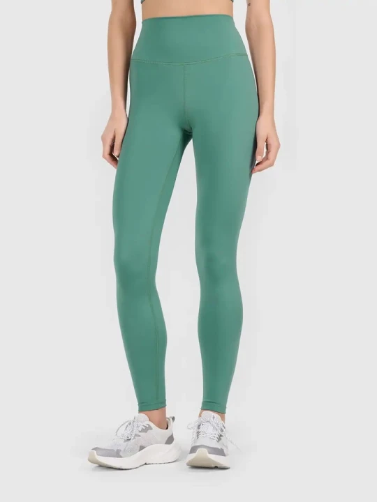 Zdjęcie produktu 4F Legginsy sportowe w kolorze zielonym rozmiar: S