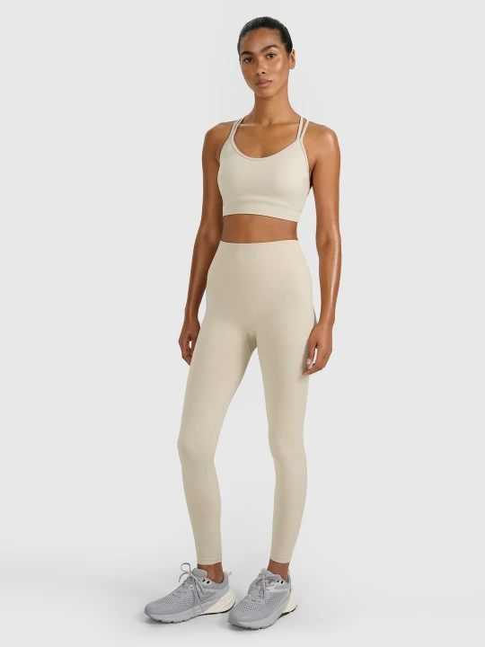 Zdjęcie produktu 4F Legginsy treningowe bezszwowe damskie - beżowe M / L