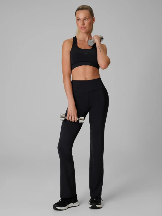 Zdjęcie produktu 4F Legginsy treningowe z rozszerzanymi nogawkami damskie - czarne XS
