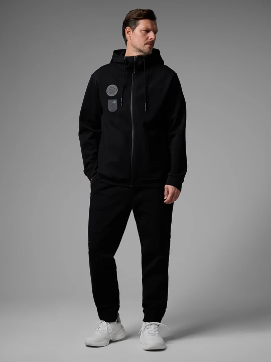 Zdjęcie produktu 4F Spodnie dresowe joggery męskie 4F x Robert Lewandowski - czarne XL