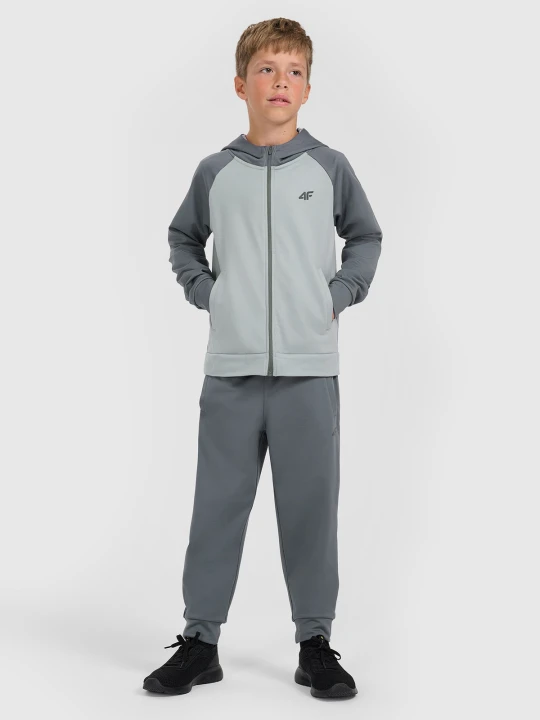 Zdjęcie produktu 4F Spodnie sportowe szybkoschnące joggery chłopięce - szare 122 / 128 (6-8 lat)
