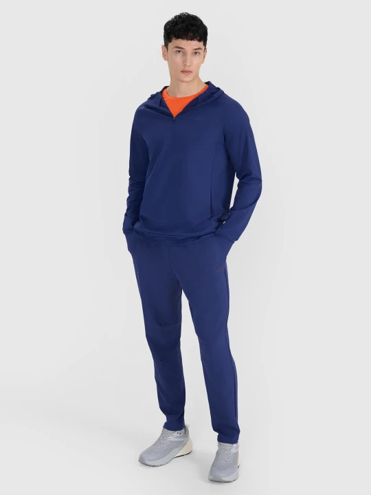 Zdjęcie produktu 4F Spodnie treningowe szybkoschnące męskie 4F x Robert Lewandowski - granatowe XL