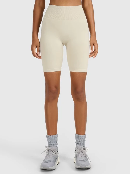 Zdjęcie produktu 4F Szorty sportowe w kolorze beżowym rozmiar: M / L