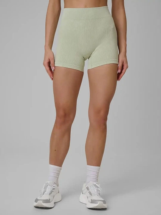 Zdjęcie produktu 4F Szorty sportowe w kolorze kremowym rozmiar: M/L
