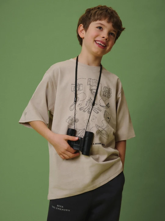 Zdjęcie produktu 4F T-shirt loose z nadrukiem chłopięcy - beżowy 122 / 128 (6-8 lat)
