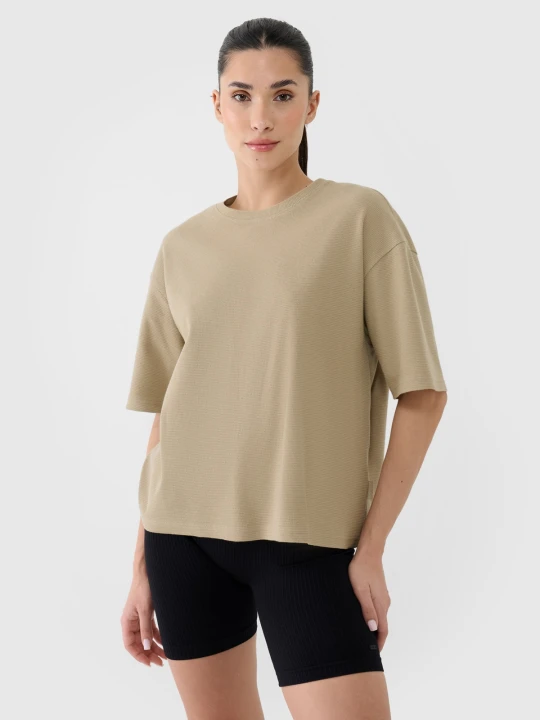 Zdjęcie produktu 4F T-shirt regular z waflowej dzianiny damski - beżowy XS