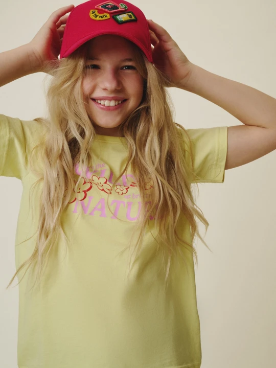 Zdjęcie produktu 4F T-shirt regular z nadrukiem dziewczęcy - żółty 146 (10-11 lat)
