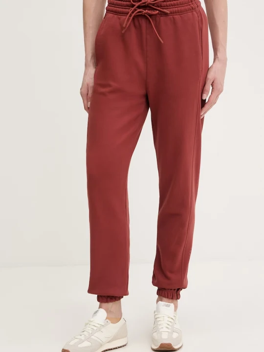 Zdjęcie produktu adidas by Stella McCartney spodnie dresowe bawełniane pomarańczowy