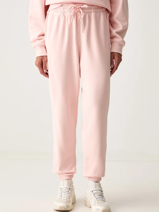 Zdjęcie produktu adidas by Stella McCartney spodnie dresowe damskie z bawełną różowy