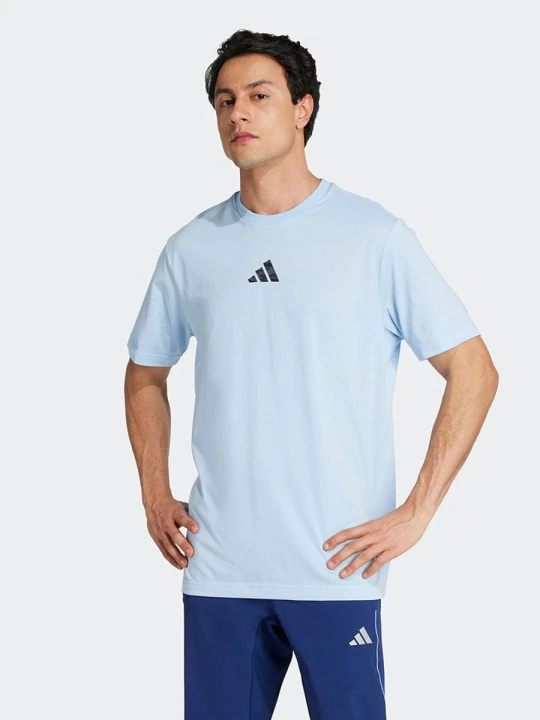 Zdjęcie produktu adidas Koszulka sportowa w kolorze błękitnym rozmiar: L