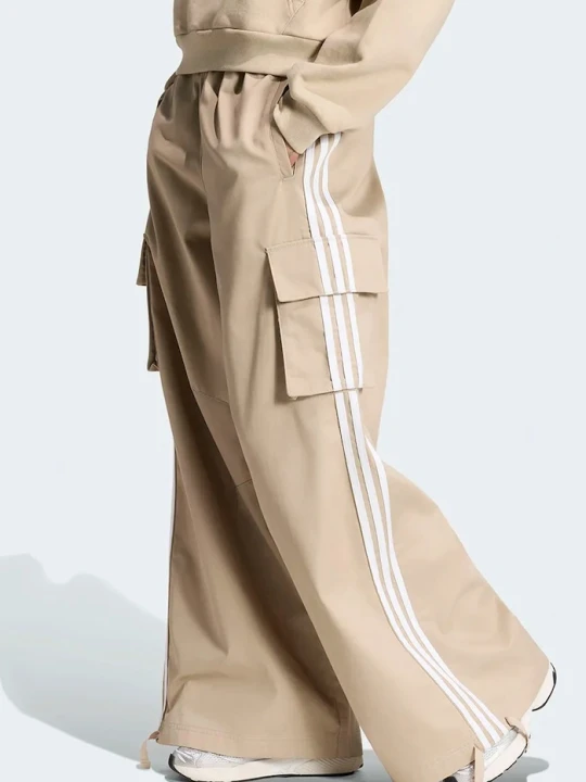 Zdjęcie produktu adidas Originals spodnie cargo damskie Firebird Adilenium beżowy