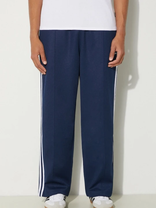 Zdjęcie produktu adidas Originals spodnie dresowe Adicolor Baggy Fit Firebird Pant granatowy