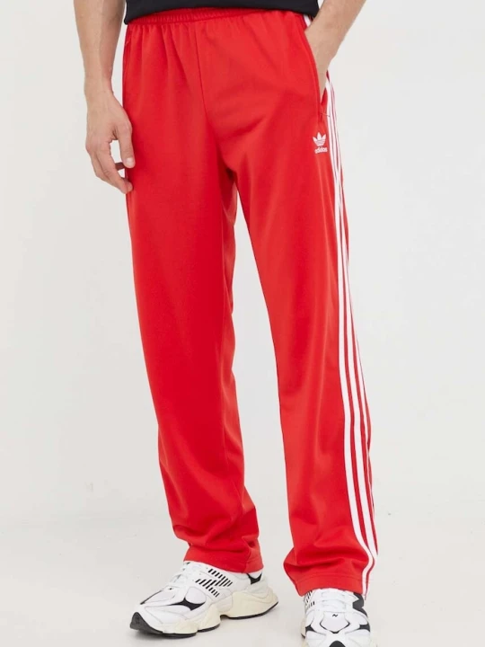 Zdjęcie produktu adidas Originals spodnie dresowe Adicolor Classics Firebird czerwony