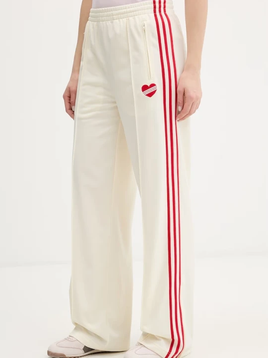 Zdjęcie produktu adidas Originals spodnie dresowe damskie beżowy