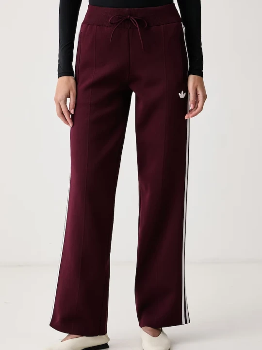 Zdjęcie produktu adidas Originals spodnie dresowe damskie Adilenium Season 6 Straight Knit bordowy