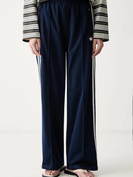 Zdjęcie produktu adidas Originals spodnie dresowe damskie Firebird granatowy