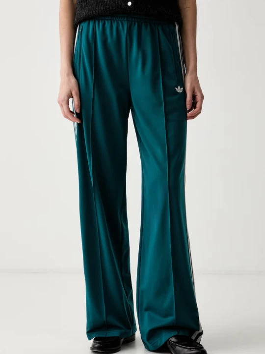 Zdjęcie produktu adidas Originals spodnie dresowe damskie Firebird turkusowy