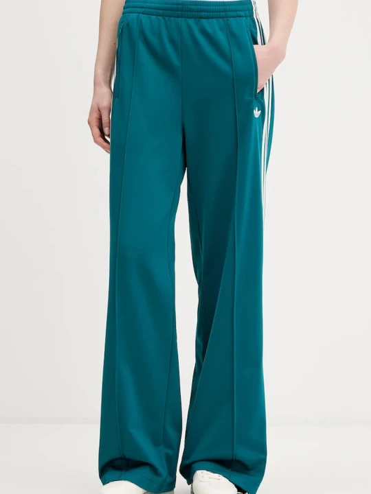 Zdjęcie produktu adidas Originals spodnie dresowe damskie Firebird turkusowy