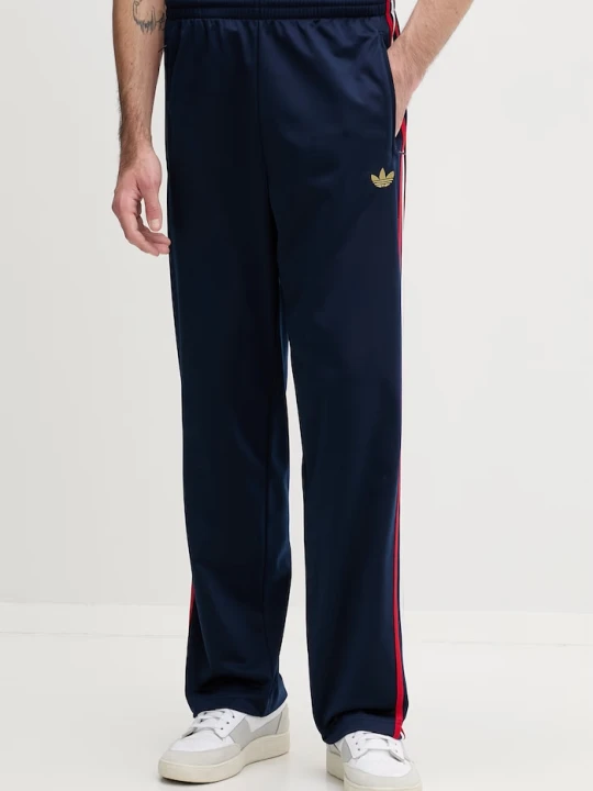 Zdjęcie produktu adidas Originals spodnie dresowe Firebird granatowy