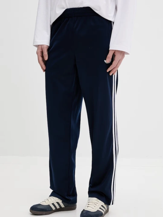 Zdjęcie produktu adidas Originals spodnie dresowe męskie Firebird granatowy
