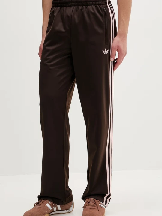 Zdjęcie produktu adidas Originals spodnie dresowe Firebird brązowy