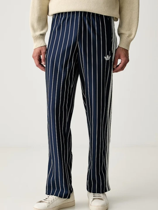 Zdjęcie produktu adidas Originals spodnie dresowe męskie Firebird Pinstripes granatowy