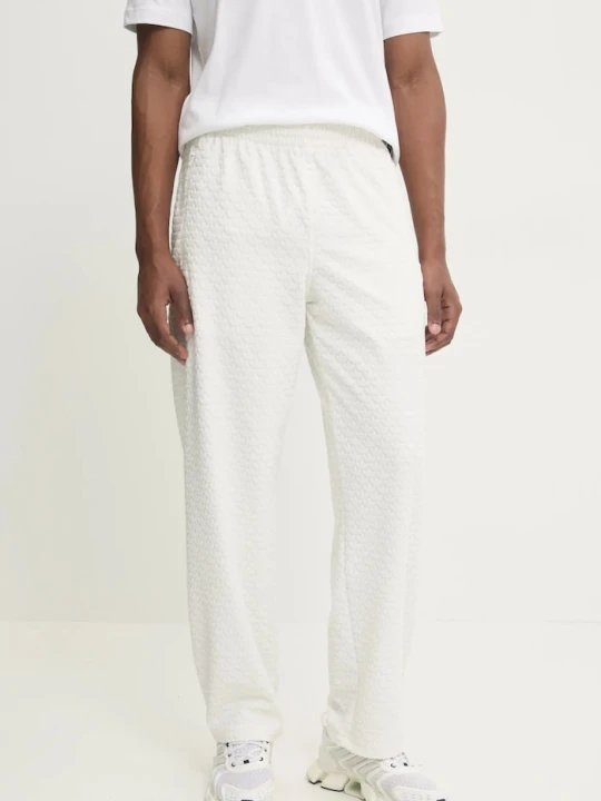 Zdjęcie produktu adidas Originals spodnie dresowe Q12 MONOGRAM TR beżowy