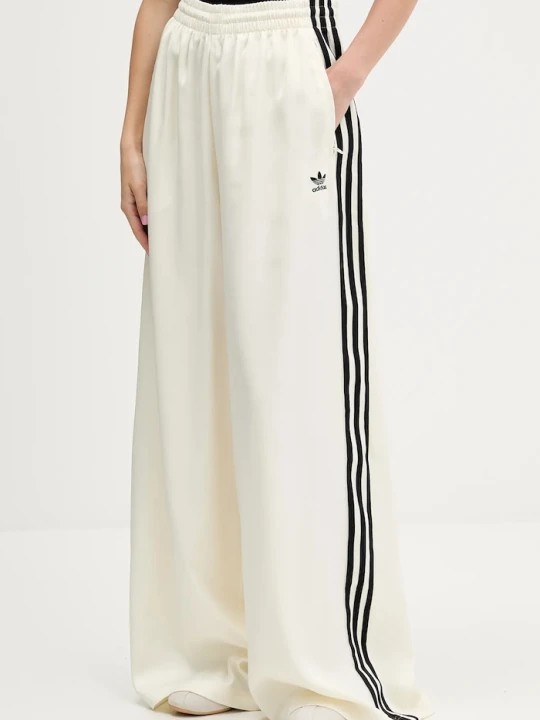 Zdjęcie produktu adidas Originals spodnie dresowe Satin Tp Wl beżowy