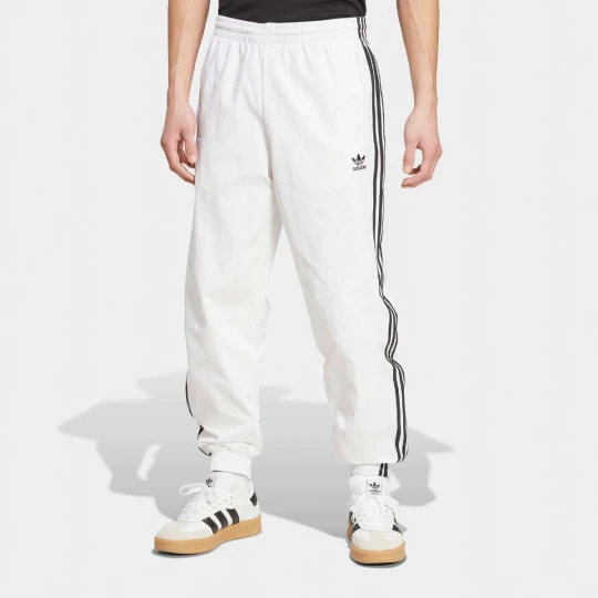 Zdjęcie produktu Spodnie treningowe adicolor Firebird adidas Originals biały