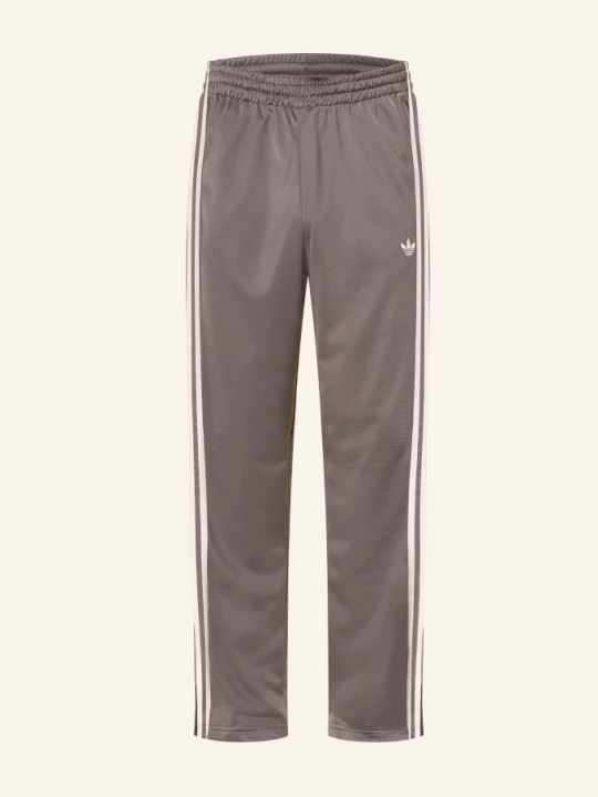 Zdjęcie produktu Adidas Originals Spodnie Treningowe Firebird Z Galonowymi Paskami braun CZIEMNOSZARY