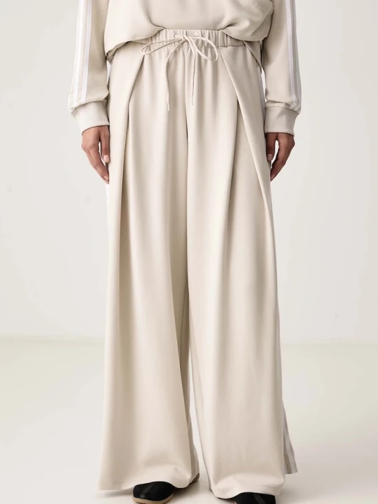 Zdjęcie produktu adidas Originals spodnie wide leg damskie Adiluna Season 2 x Jennie beżowy