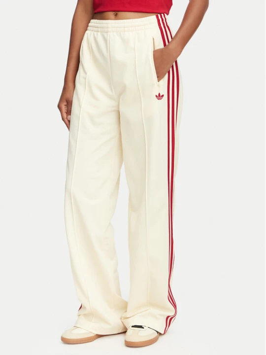 Zdjęcie produktu adidas Spodnie dresowe Firebird Loose Tracksuit KS4671 Kremowy Loose Fit