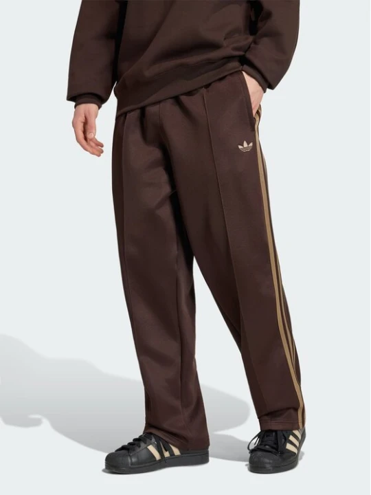 Zdjęcie produktu adidas Spodnie dresowe 165005 Brązowy Loose Fit