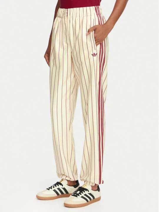 Zdjęcie produktu adidas Spodnie dresowe Pinstripe Firebird Track Ptan KT1851 Kremowy Regular Fit