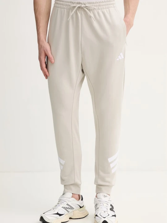 Zdjęcie produktu adidas spodnie dresowe beżowy