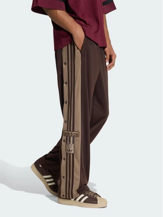 Zdjęcie produktu adidas Spodnie dresowe Adibreak Classic KS7398 Brązowy ciemny Regular Fit
