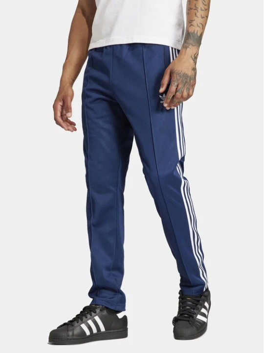 Zdjęcie produktu adidas Spodnie dresowe adicolor Classics Beckenbauer IP0421 Niebieski Slim Fit