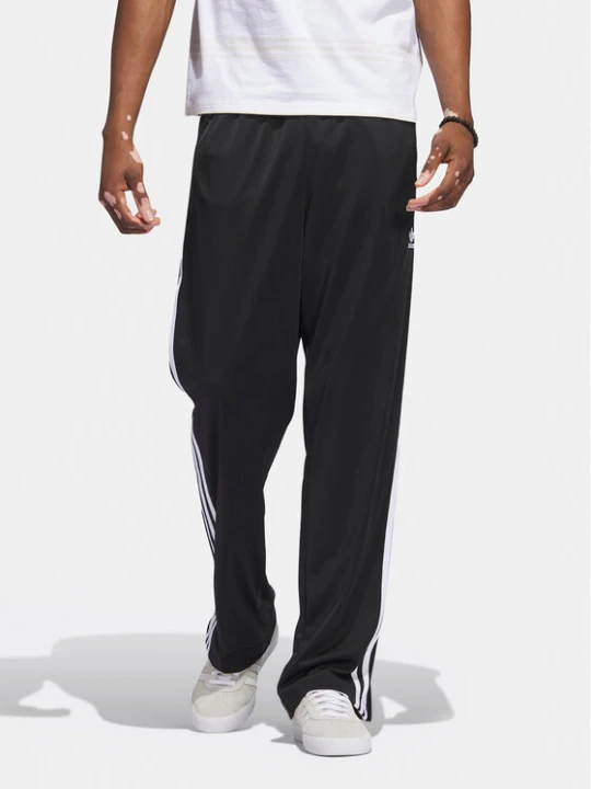 Zdjęcie produktu adidas Spodnie dresowe adicolor Classics Firebird IJ7055 Czarny Regular Fit