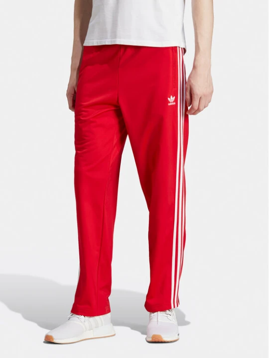 Zdjęcie produktu adidas Spodnie dresowe adicolor Classics Firebird IJ7057 Czerwony Regular Fit