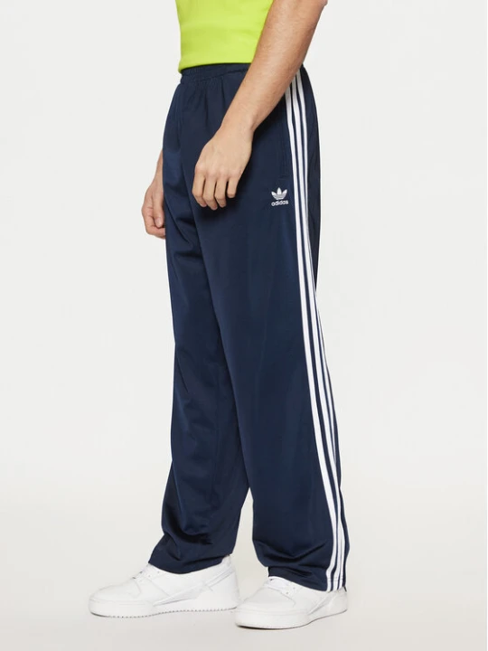 Zdjęcie produktu adidas Spodnie dresowe adicolor Classics Firebird IM9471 Granatowy Regular Fit