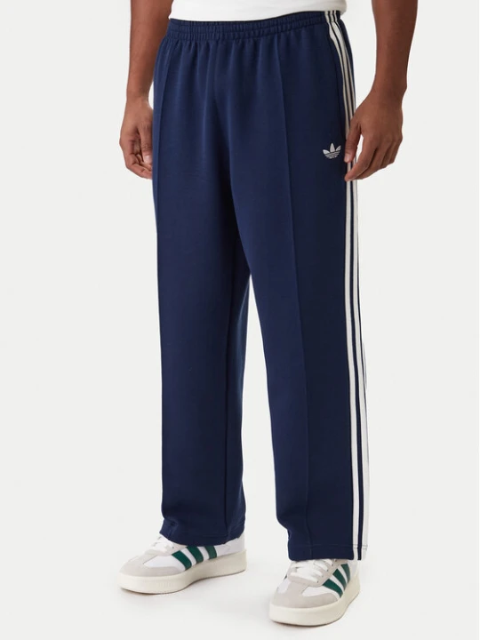 Zdjęcie produktu adidas Spodnie dresowe adicolor Spacer Track KD4087 Granatowy Baggy Fit