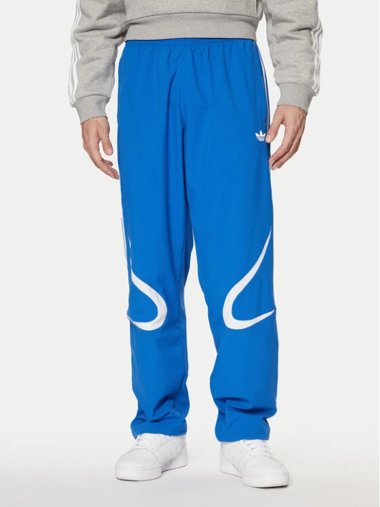 Zdjęcie produktu adidas Spodnie dresowe adicolor Teamgeist JP1120 Niebieski Regular Fit